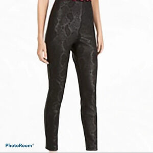 Ricki’s  black snake print ankle pants 0